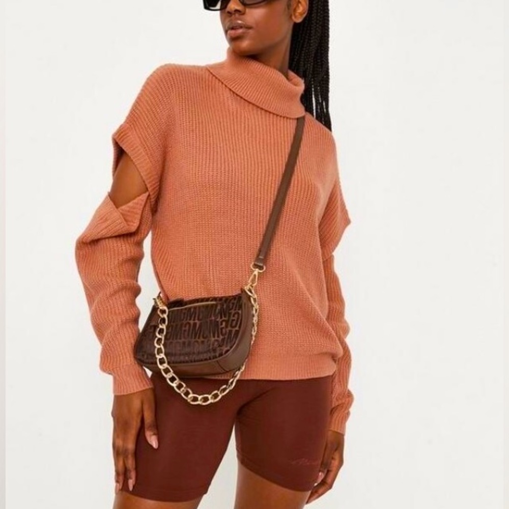Rust coloured cut out long sleeve sweater